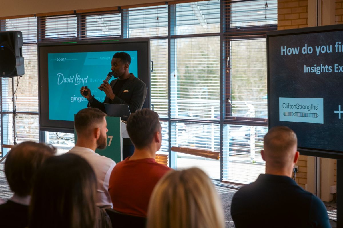 John Obidipe speaking at a CliftonStrengths event